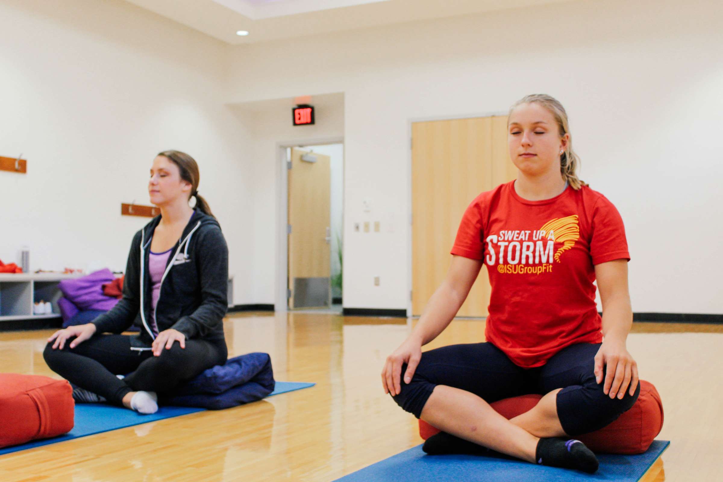 Two students meditating